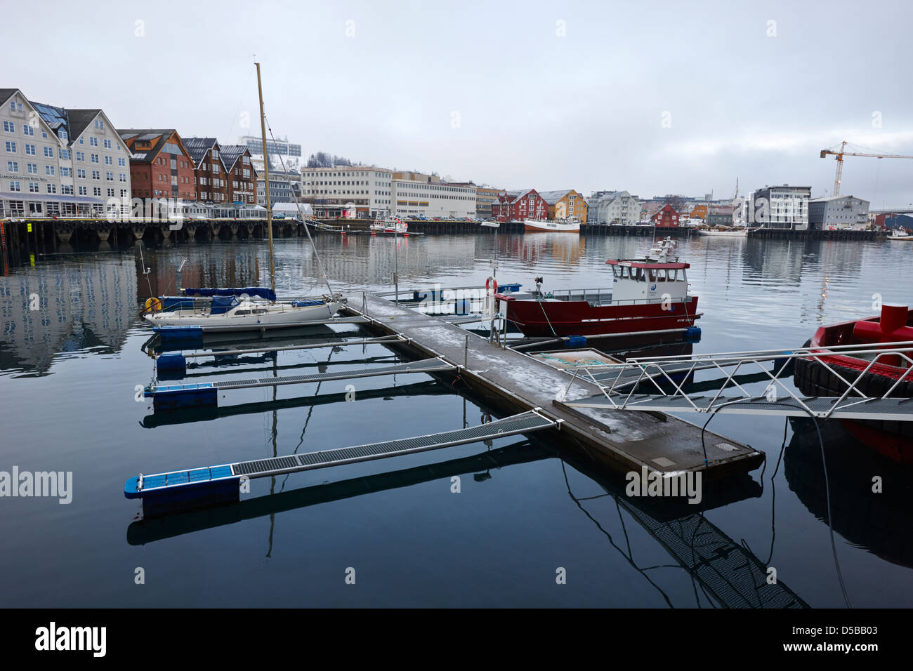 floating pontoons in old Tromso harbour troms Norway europe Stock Photo