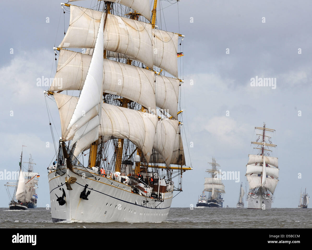 The tall ship 'Gorch Fock' (2-L) of the German Navy, the Russian 'Kruzenstern' (3-L, black hulk), the Russian 'Mir' (4-L) and the Polish 'Dar Mlodzezy' (5-L)of the maritime University in Gdynia meet during the Windjammer festival 'Sail 2010' in Bremerhaven, Germany, 25 August 2010. More than 200 ships from 15 nations participate in the maritime festival (25-29 August 2010). Around  Stock Photo