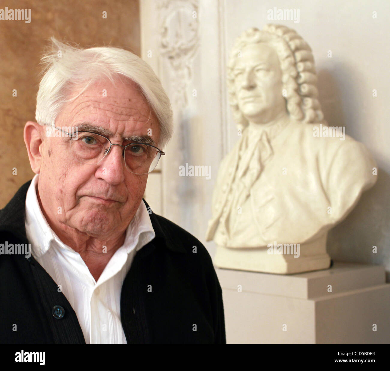 Hans Georg Schaefer, director of the Bach festival, stands next to a ...