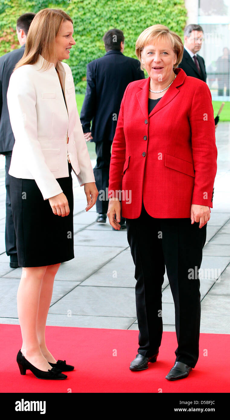German Chancellor Angela Merkel (R) receives Finnish Prime Minister Mari Johanna Kiviniemi in front of the Chancellery in Berlin, Germany, 01 September 2010. Photo: WOLFGANG KUMM Stock Photo