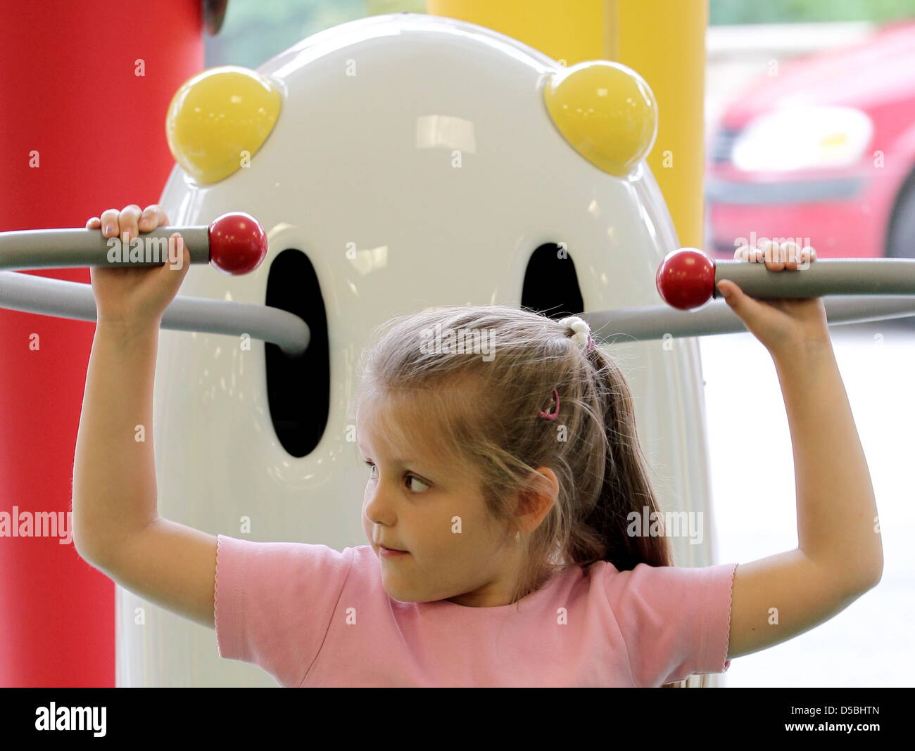 A file picture taken on 6 August 2010 shows children working out on  machines at the children's gym club 'Cool Kids' in the South Hessian town  of Buettelborn, Germany. The machines have