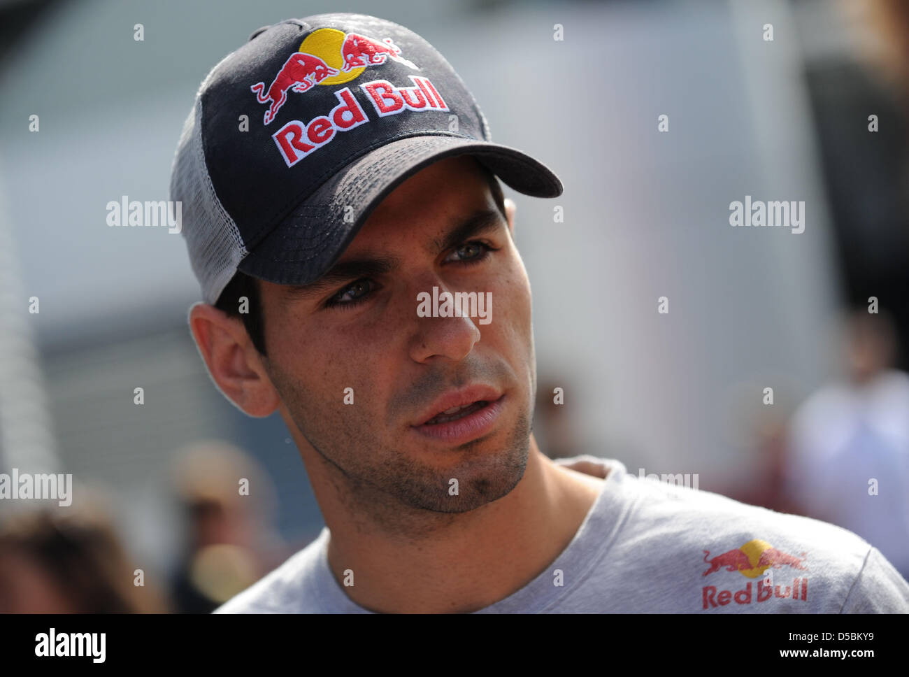 Spanish Jaime Alguersuari of Toro Rosso talks to journalists in front