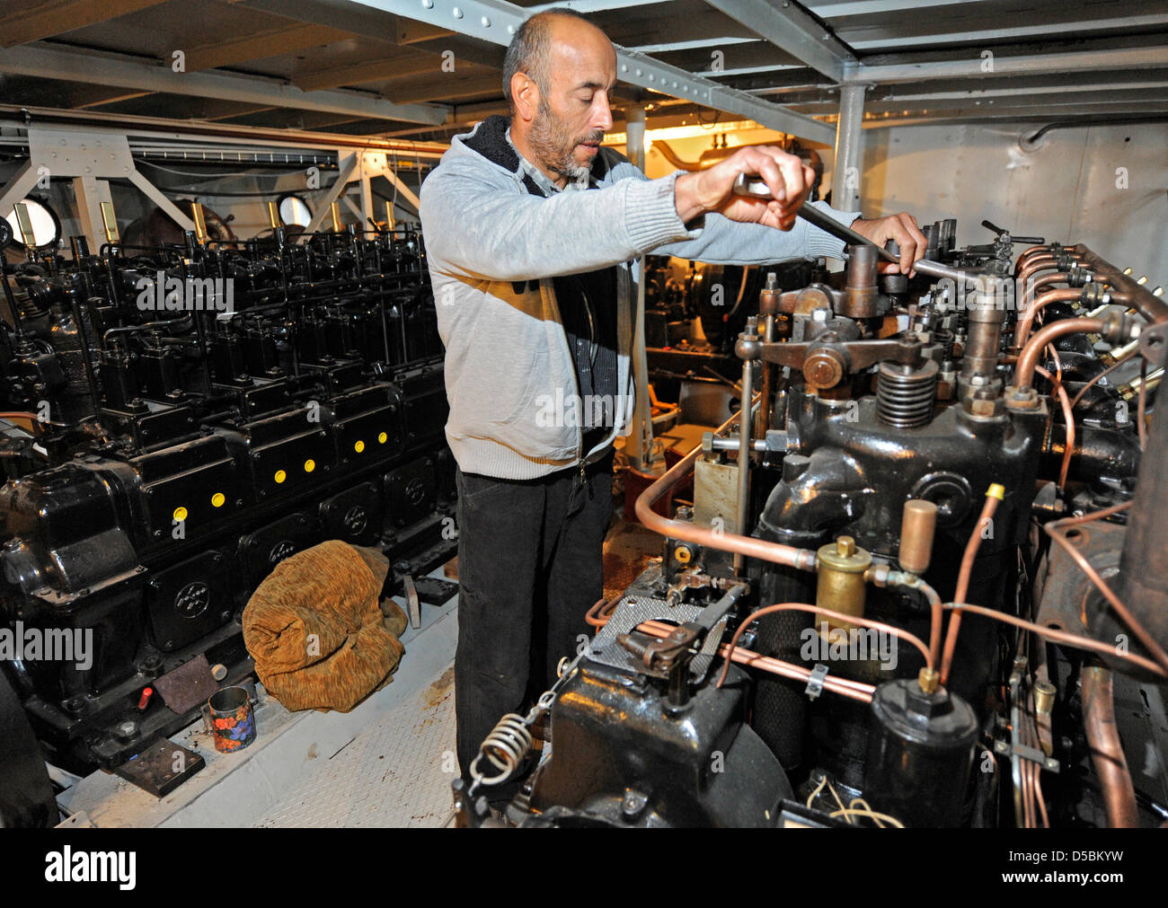 Mechanic Hans Galitzki works on the engine of Europe's first domestic car  ferry 'Konstanz' in Constance, Germany, 08 September 2010. The renovation  has been carried on by the club 'Save the Meersburg