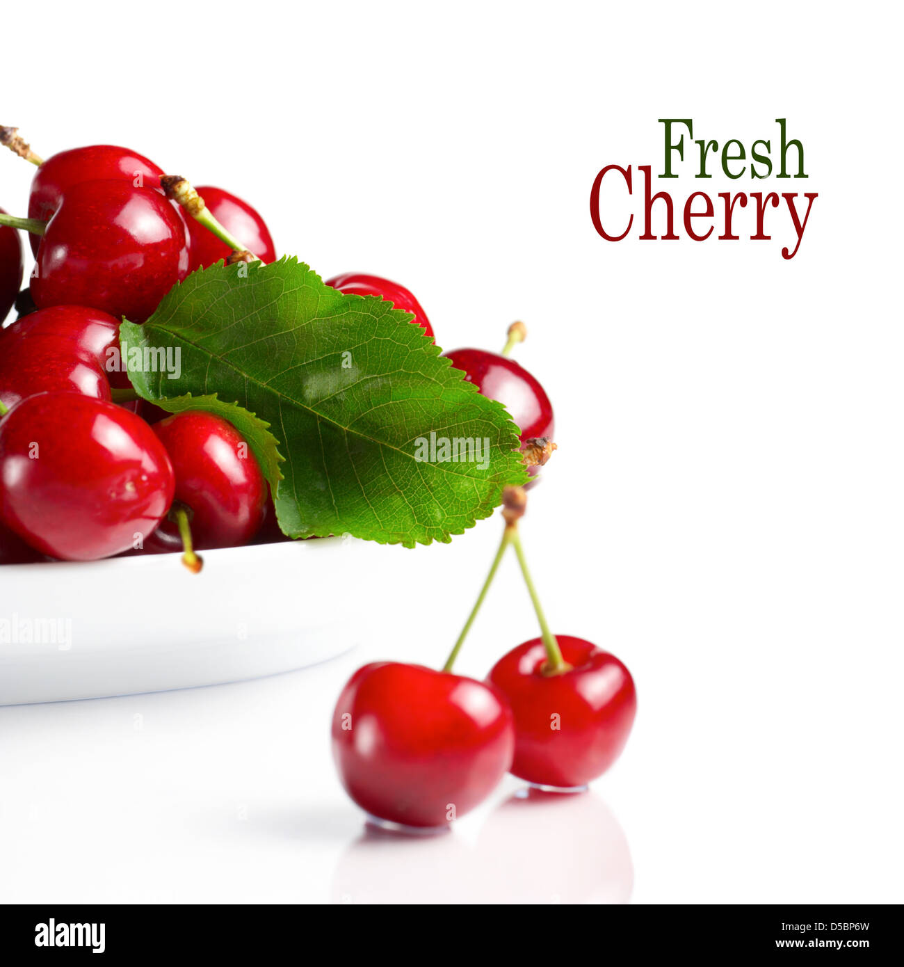 Fresh cherry berries with green leave isolated on white Stock Photo Alamy