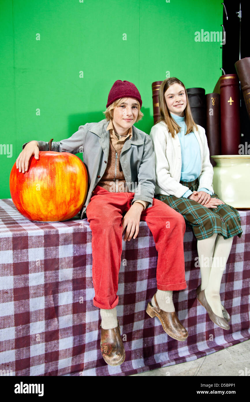 Justus Kammerer and Pauline Renevier on the set of German TV movie 'Nils Holgersson' at Cinegate studios Hamburg, Germany - Stock Photo