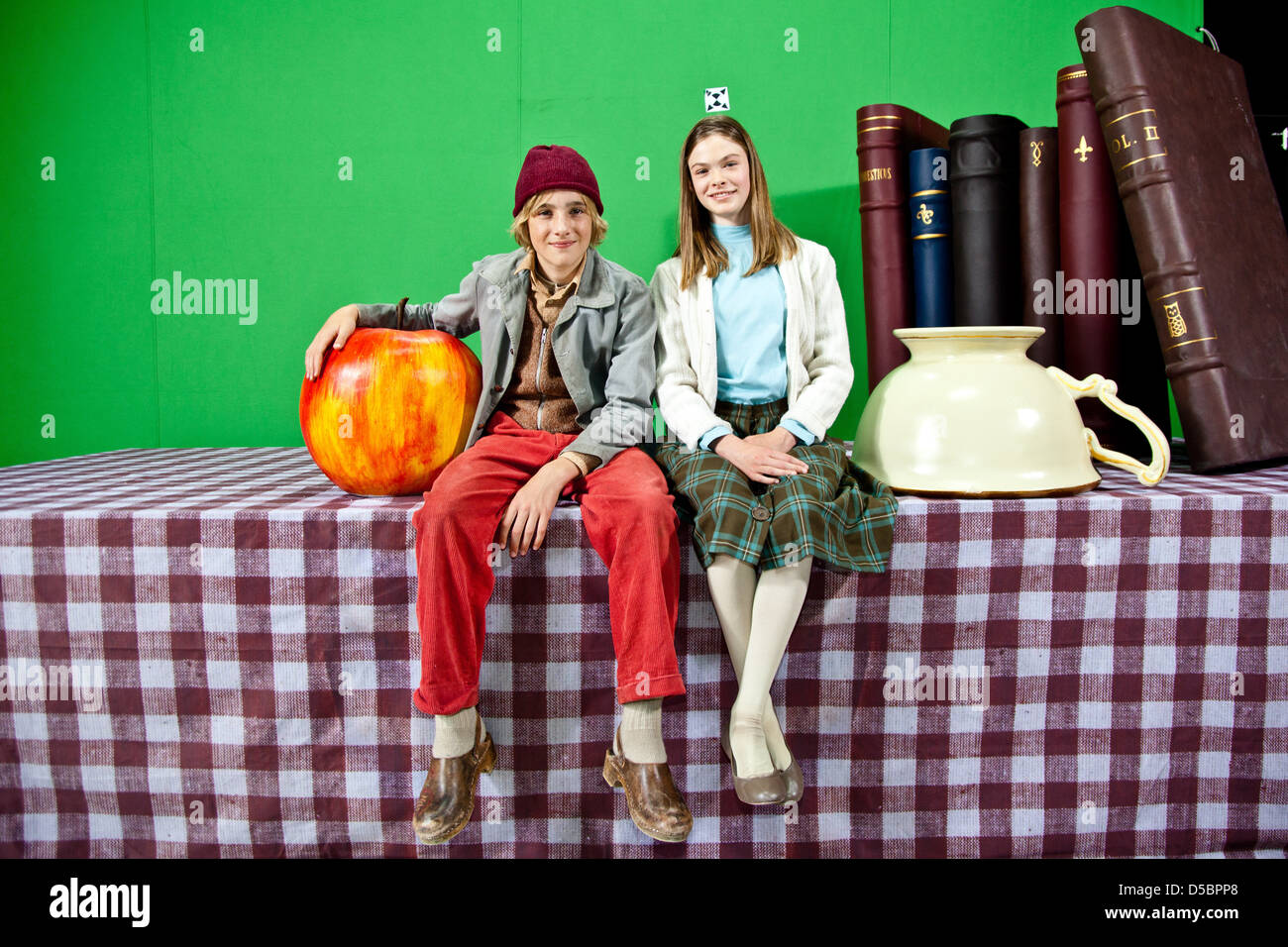 Justus Kammerer and Pauline Renevier on the set of German TV movie 'Nils Holgersson' at Cinegate studios. Hamburg, Germany - Stock Photo