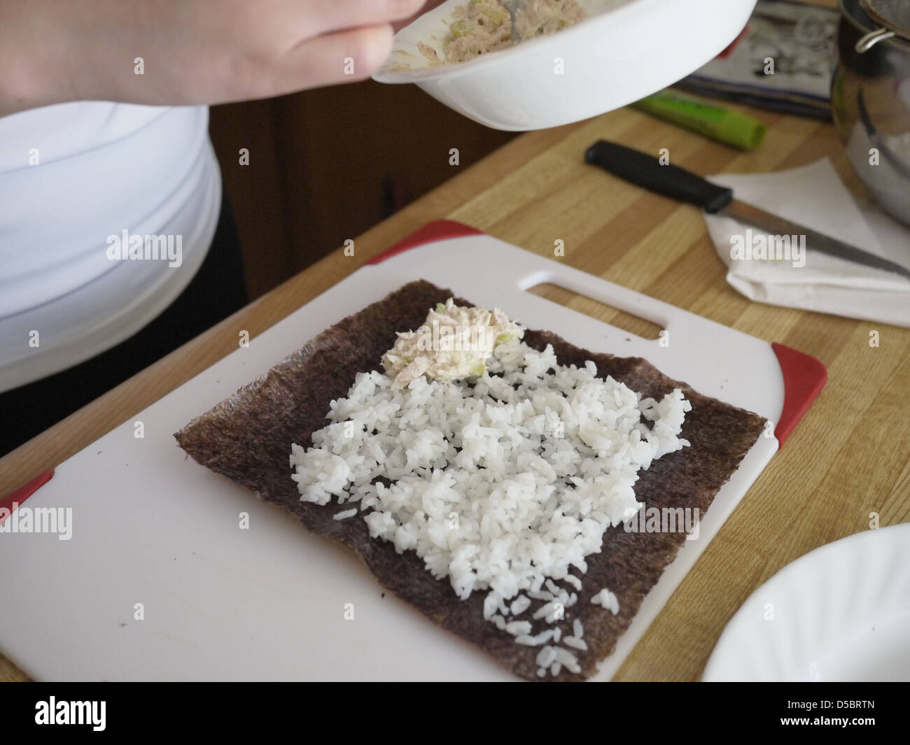 making sushi seaweed rice home Stock Photo Alamy