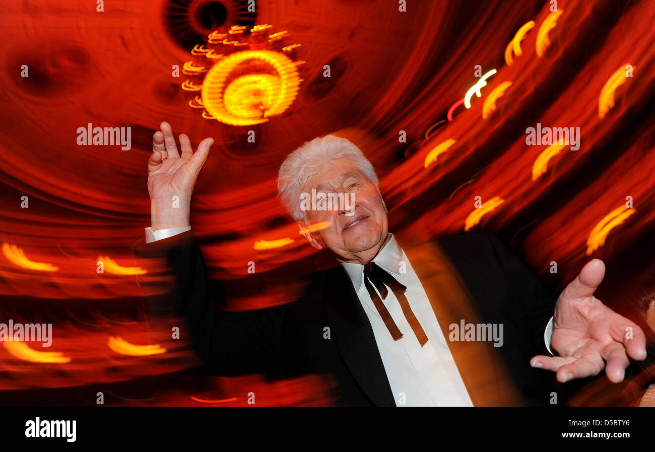 Choir conductor Gotthilf Fischer celebrates during the 5th Semper opera ball in Dresden, Germany, 15 January 2010. Over 2,000 guests from economy, politics and culture celebrated under the motto 'Dreamteams' a ball night in the theatre built by Gottfried Semper (1803-1879). Stage and auditorium of the Semper opera were remodeled for this event. Photo: Jens Kalaene Stock Photo