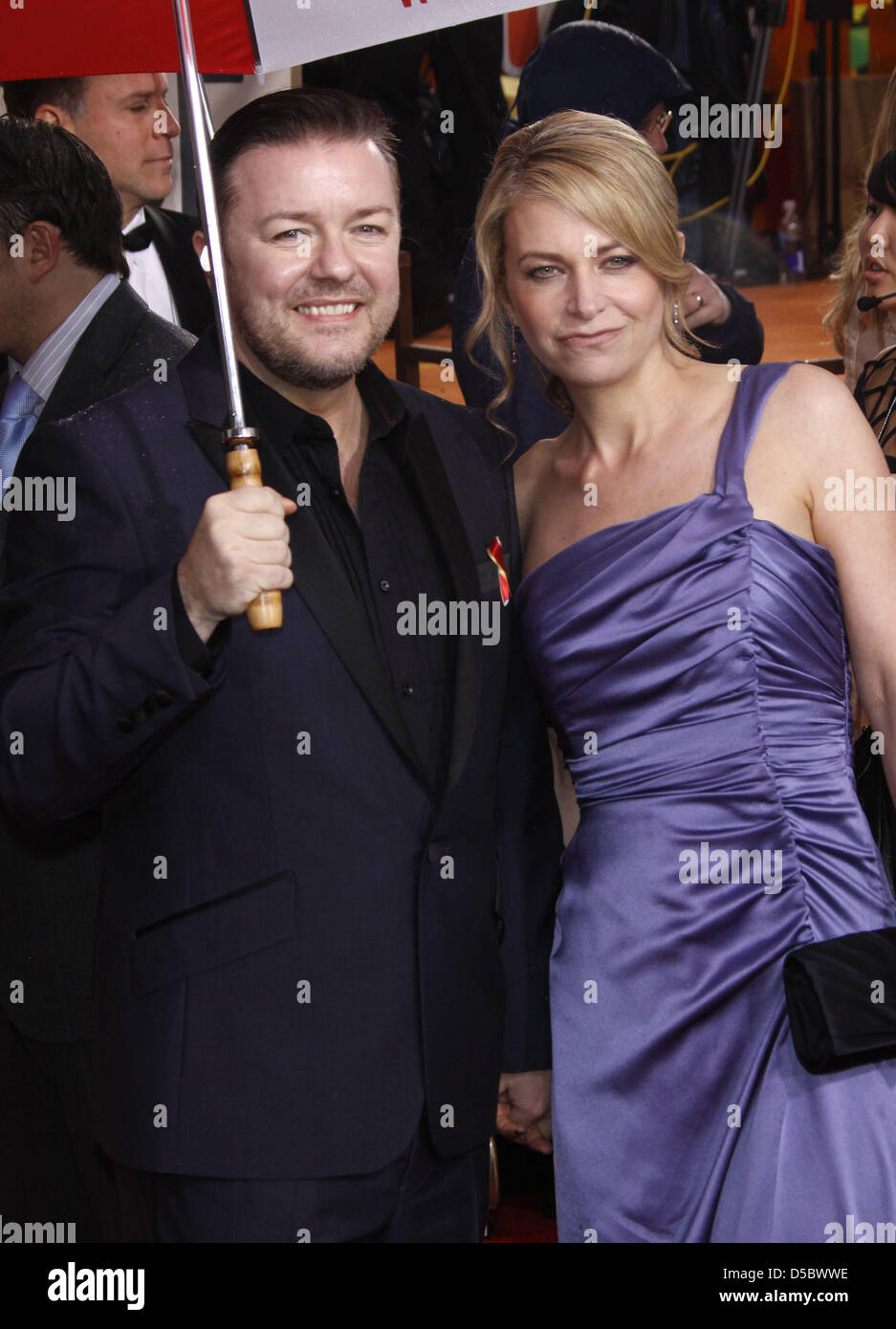 Host Ricky Gervais and his wife Jane Fallon arrive for the 67th Golden
