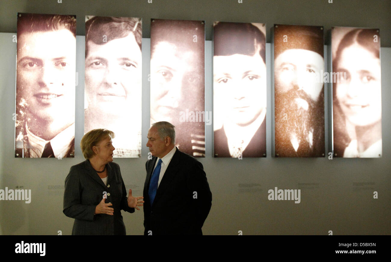 German Chancellor Angela Merkel and Israeli Prime Minister Benjamin Netanyahu talk in front of a display during a visit at the Holocaust memorial in Berlin, Germany, 18 January 2010. Netanyahu arrived in Germany on 18 January for talks with Merkel that are likely to focus on efforts to curb Iran's nuclear ambitions and renew stalled Middle East peace talks. Half a dozen cabinet col Stock Photo