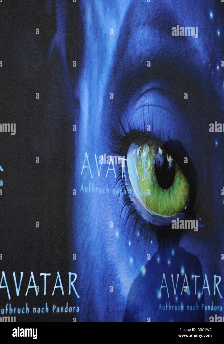 Film poster of the Science-Fiction-Epic ''Avatar'' seen at the premiere in Berlin, Germany, dated 08 December 2009. ''Avatar'' released ''Titanic'' as the world's commercial highest-grossing film. In Europe, China, India and Russia, the in 3D filmed ''Avatar'' is already number one. Only on the domestic US market, the movie of the shipsinking drama ''Titanic'' in 1997, also by Came Stock Photo