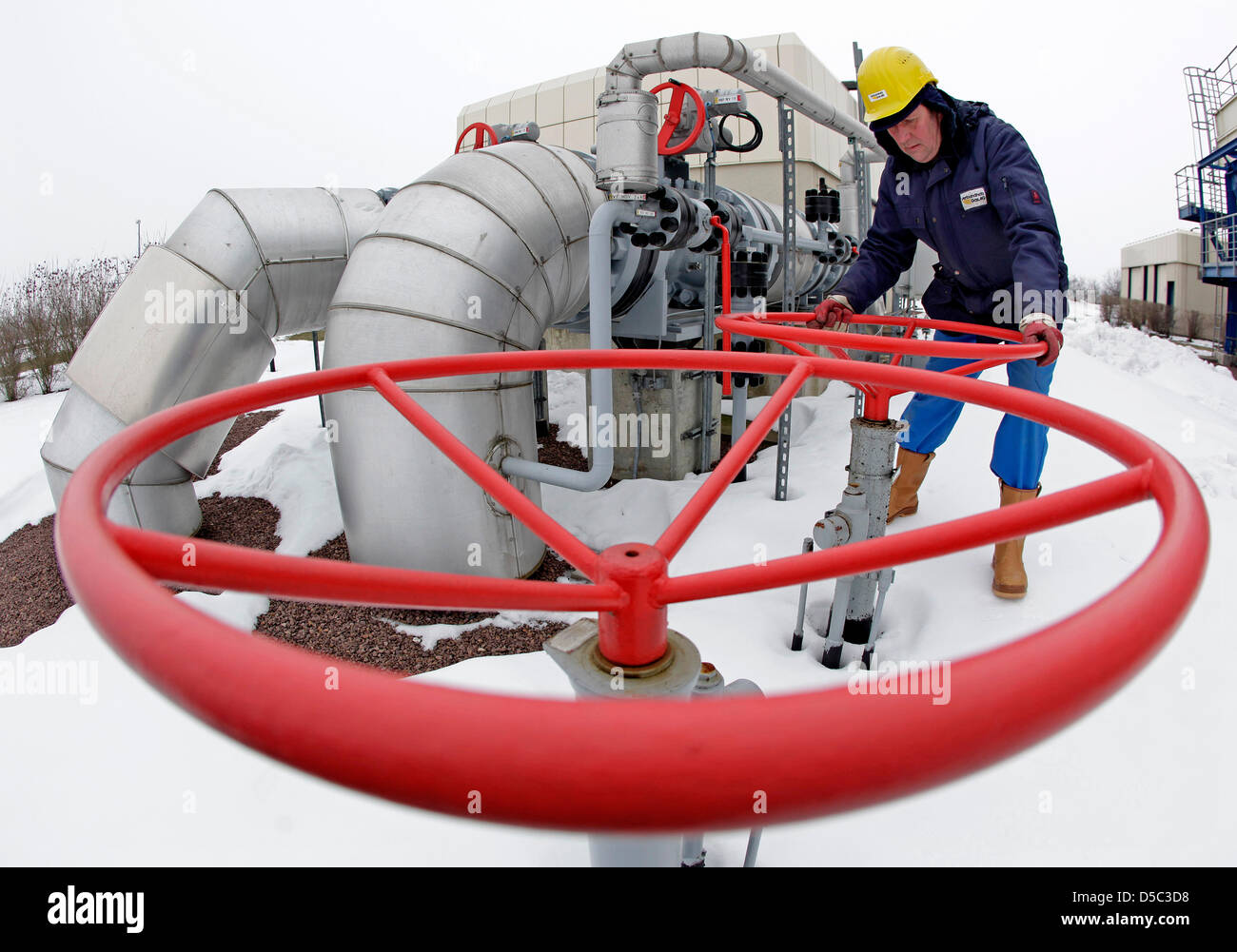 Technician Eckhard Zingler checks a turbo compressor unit of a gas turbine at VNG underground gas tank in Bad Lauchstaedt, Germany, 27 January 2010. Leipzig-based energy group VNG expands the exploration of natural gas resources in Norway. The company reports on 28 January 2010, it will become shareholder of three exploration licenses via its Norwegian subsidiary. Photo: JAN WOITAS Stock Photo