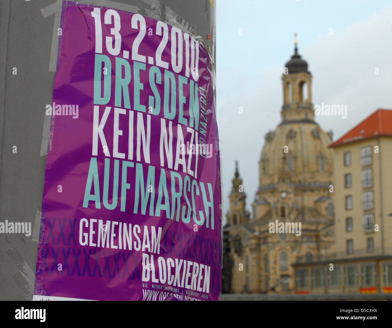 A poster protesting against a planned neo-Nazi rally hangs near Church of Our Lady in Dresden, Germany, 28 January 2010. Dresden's public prosecutor's office had seized the posters past week as a 'call for a criminal offence'. The posters were hanged on the background of persistent opposition to a planned neo-Nazi rally that was allowed under restrictions on 13 February 2010, the 6 Stock Photo