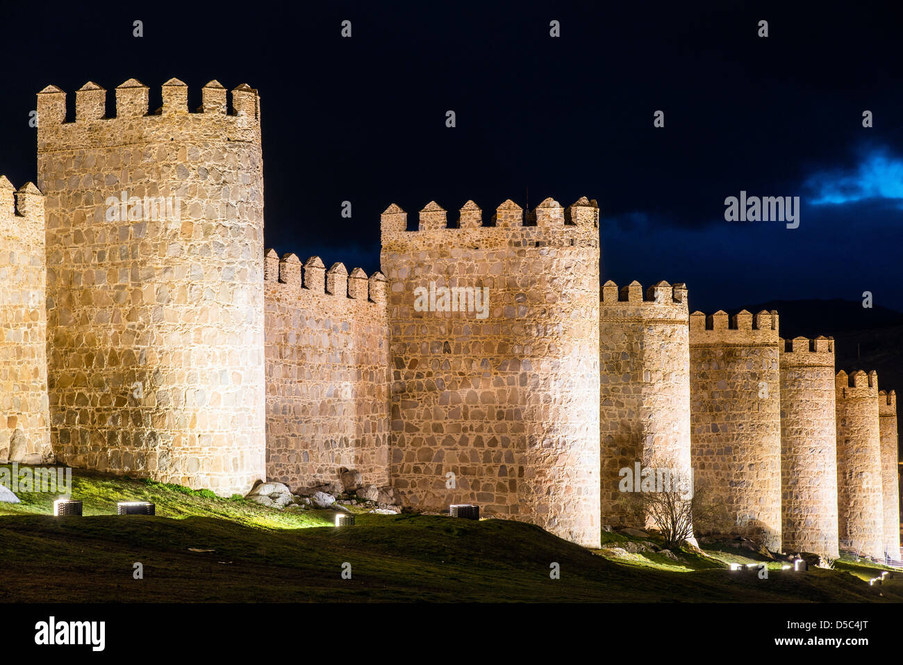 Night view of the medieval city walls in Avila, Castile and León, Spain