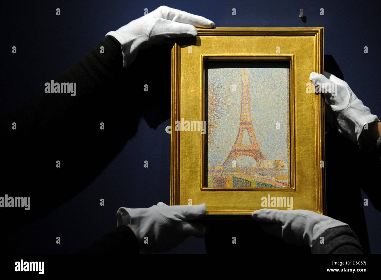 A Restorer Hangs The Work La Tour Eiffel By Georges Seurat At Stock Photo Alamy A Restorer Hangs The Work La Tour Eiffel By Georges Seurat At Stock Photo Alamy