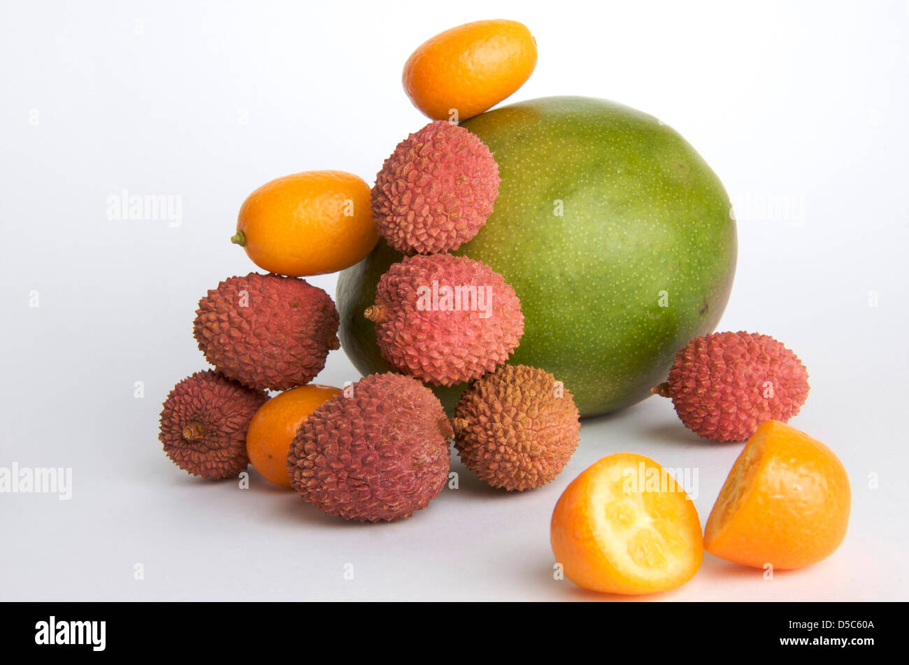 Tropical fruits, Lychees , Kumquat or Cumquat , Mango Stock Photo
