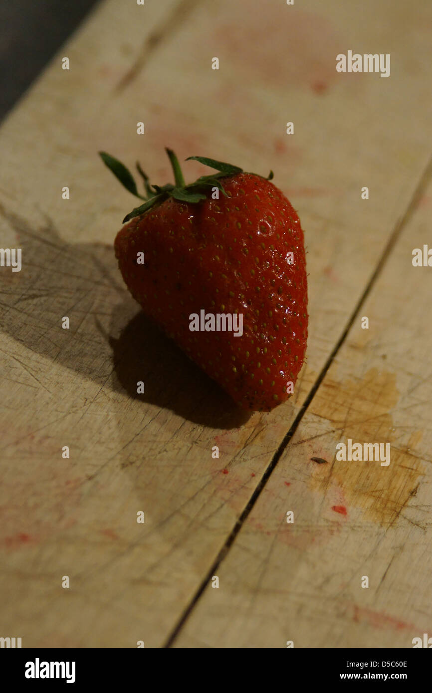 cutting board red fresh strawberry shadow wood Stock Photo