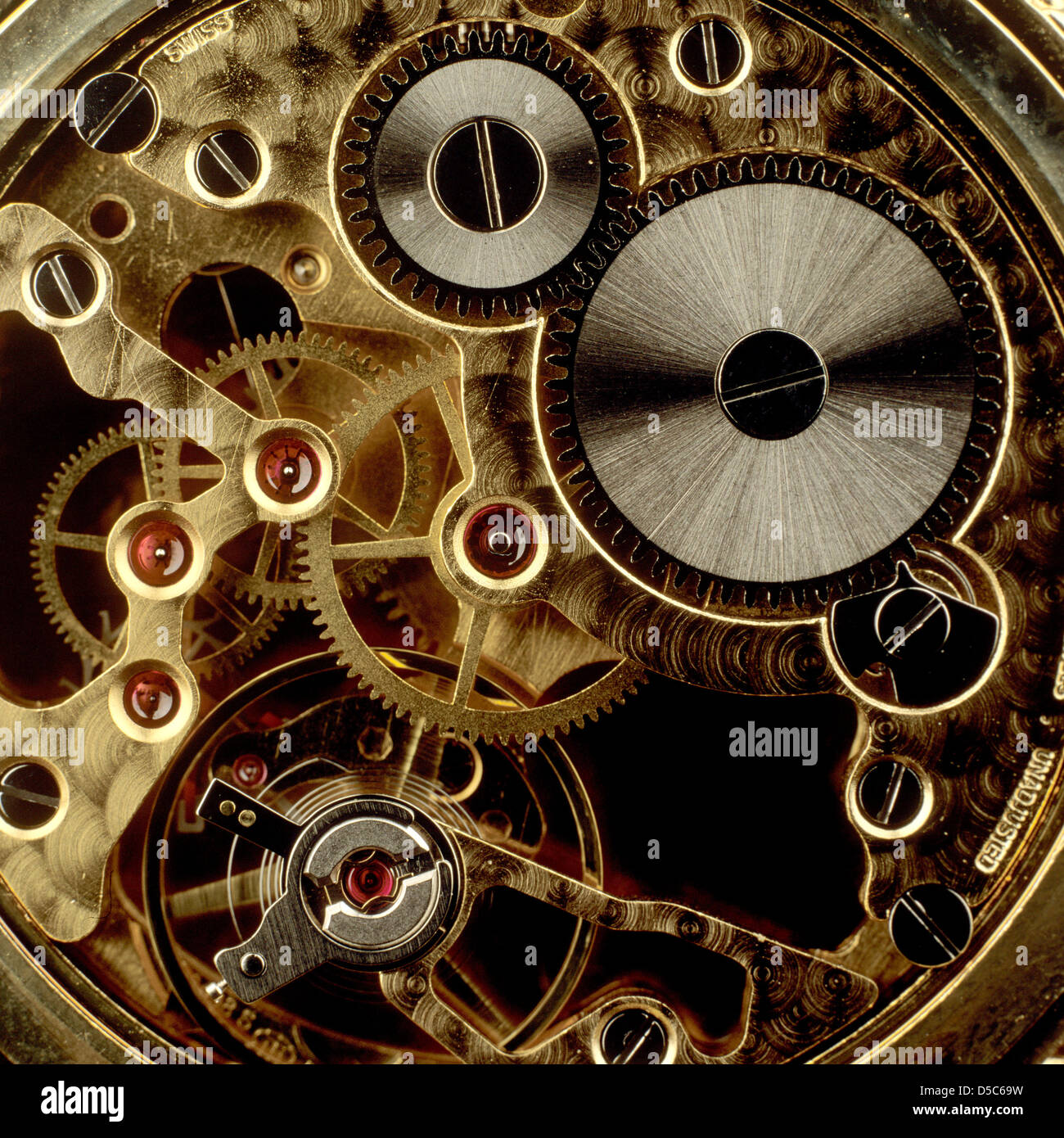 Cogs in a watch mechanism, time concept, close-up Stock Photo