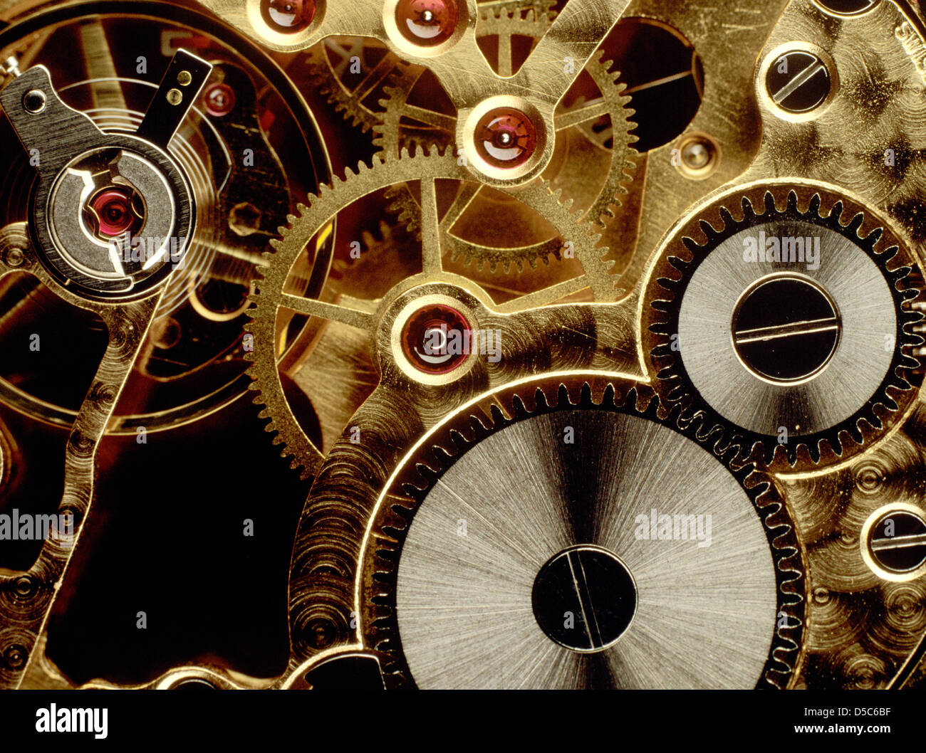 Cogs in an old watch mechanism, time concept, close-up Stock Photo