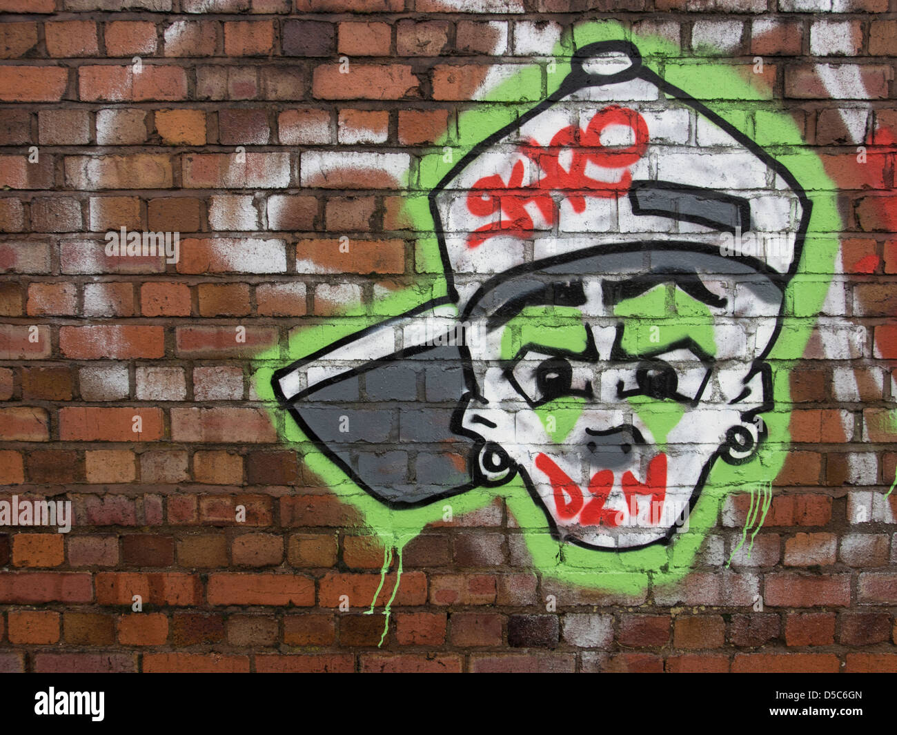 England, West Midlands, Graffiti on wall. Graffiti on wall alongside