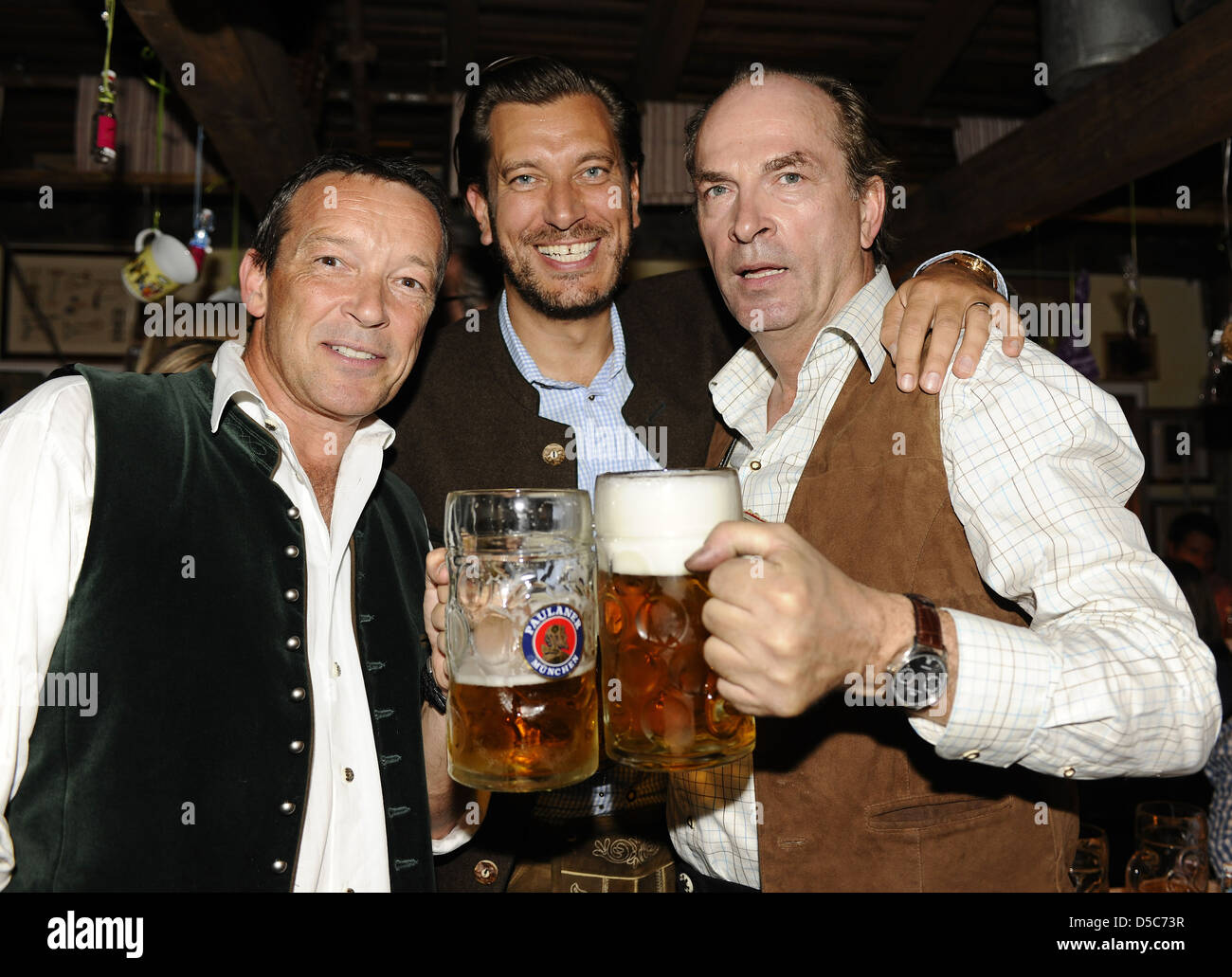 Michael Roll, Henrik Ekdahl and Herbert Knaup at Oktoberfest 2011. Munich, Germany - 29.09.2011 Stock Photo