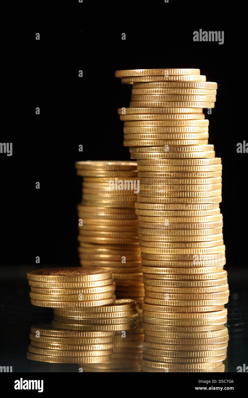 golden coins on black background Stock Photo Alamy