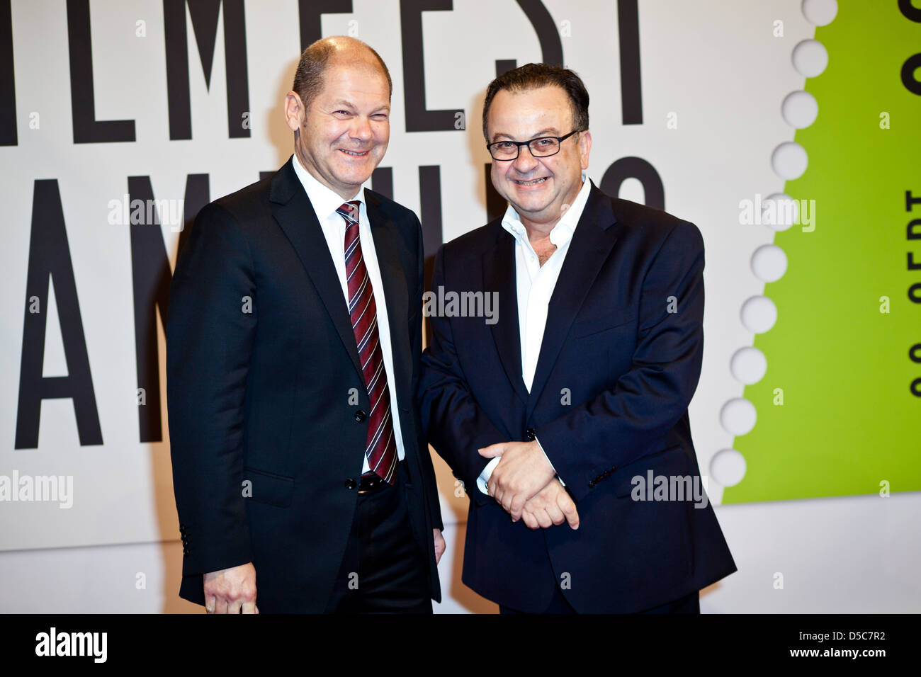 Olaf Scholz and guest at the launch of Filmfest Hamburg with the premiere of 'Auf Wiedersehen' at CinemaxX movie theatre. Stock Photo