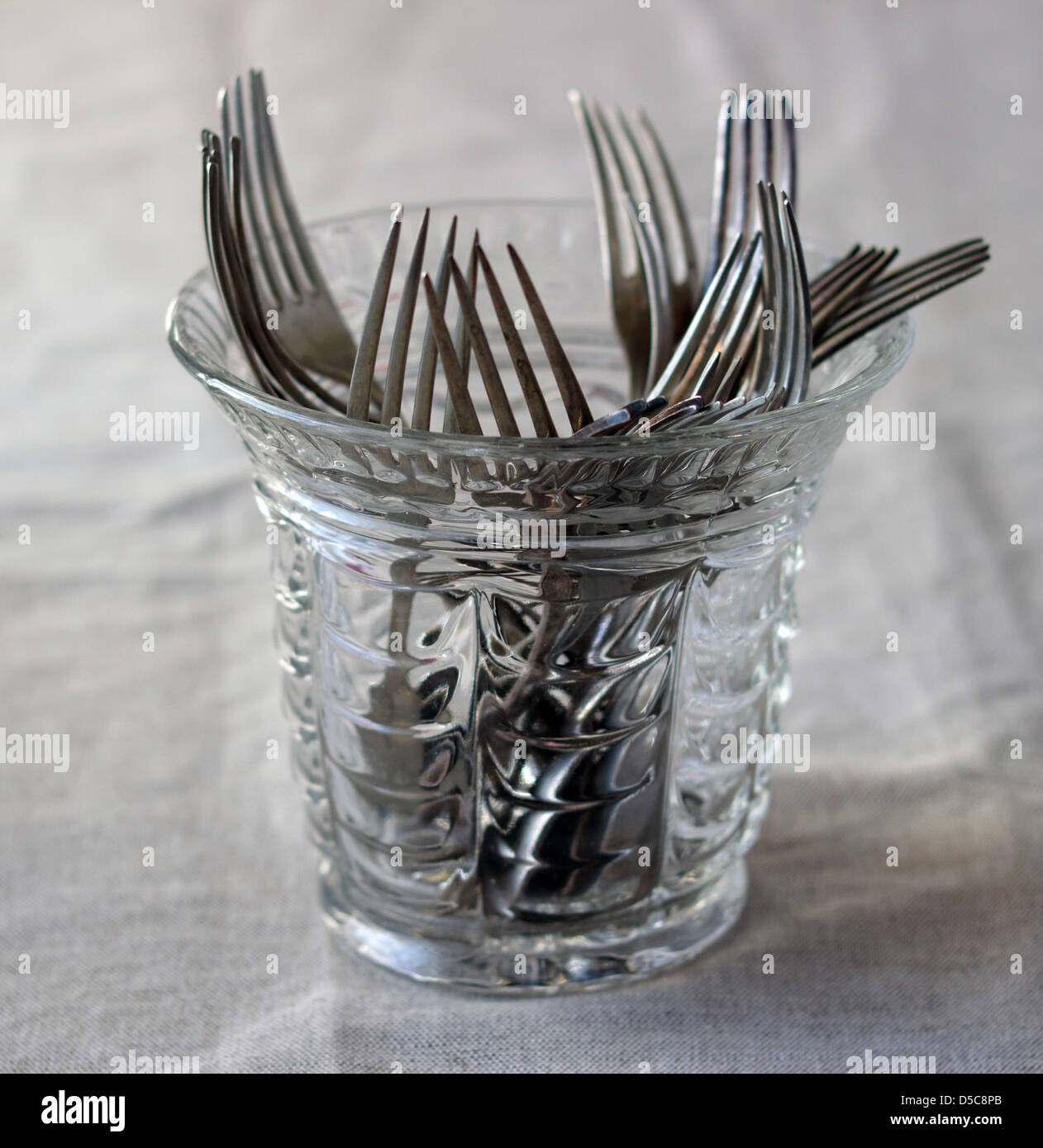 Forks in a glass vase Stock Photo