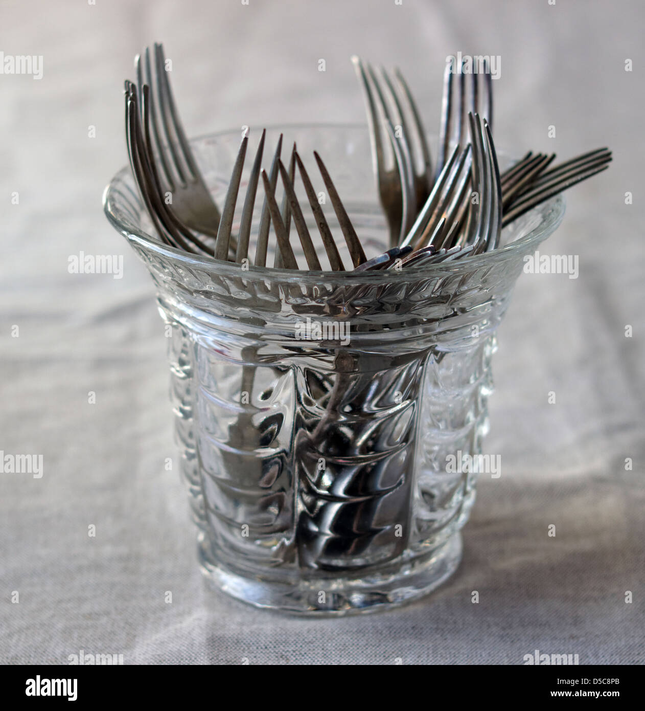 Forks in a glass vase Stock Photo Alamy