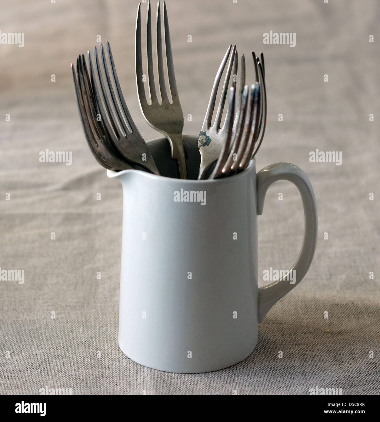 Forks in a jug Stock Photo