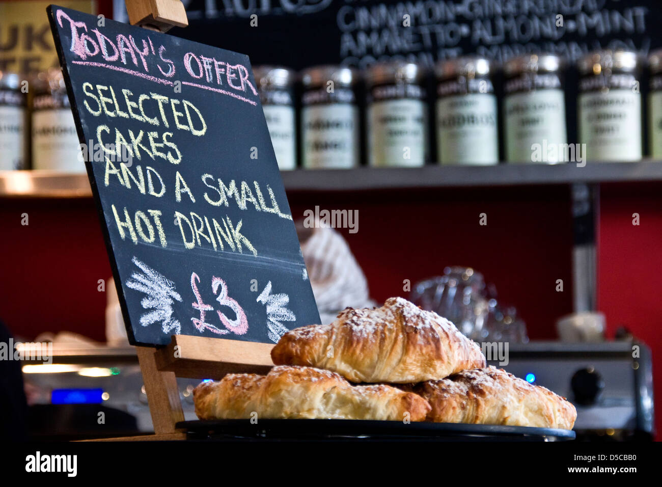 Selected cakes and a small hot drink for £3 is a special offer displayed inside a local Coffee Shop in Dundee,UK Stock Photo