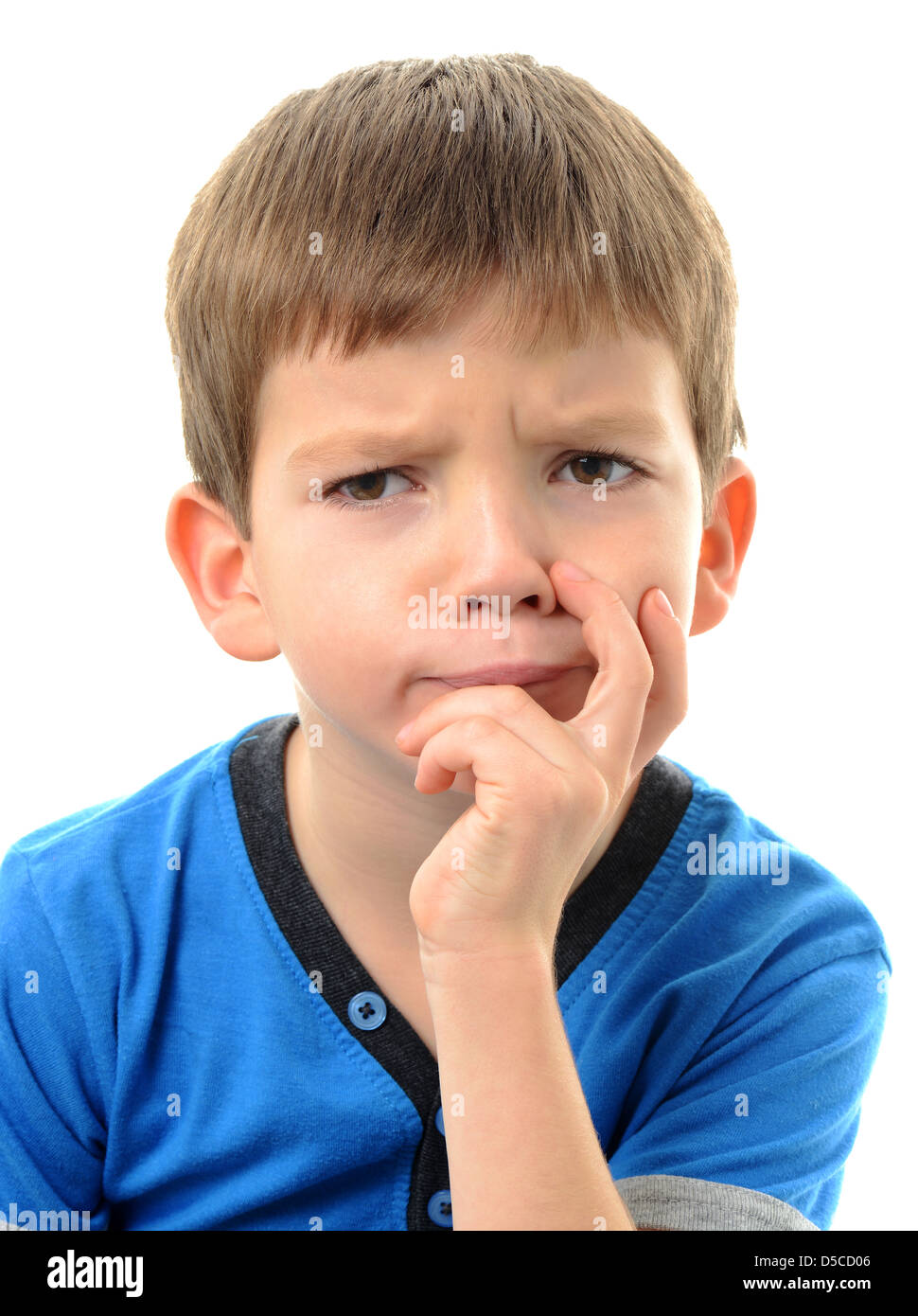 Boy looking confused, expression of confusion, confused child Stock Photo