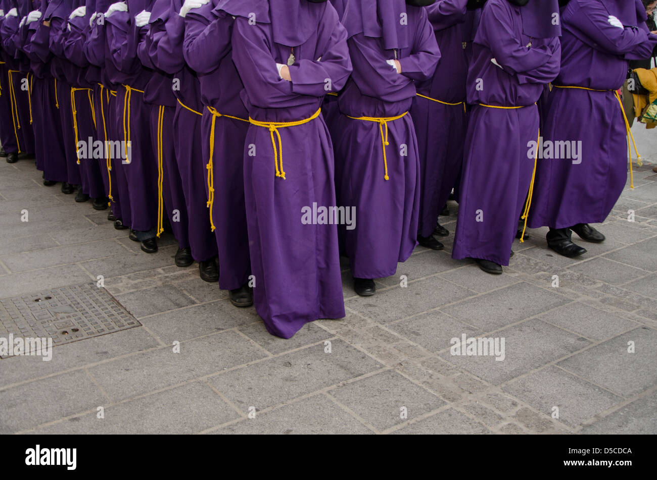 Holy week, Spain. Carriers of a throne during Holy week, semana santa in Mijas Pueblo, Malaga province, Spain. Stock Photo