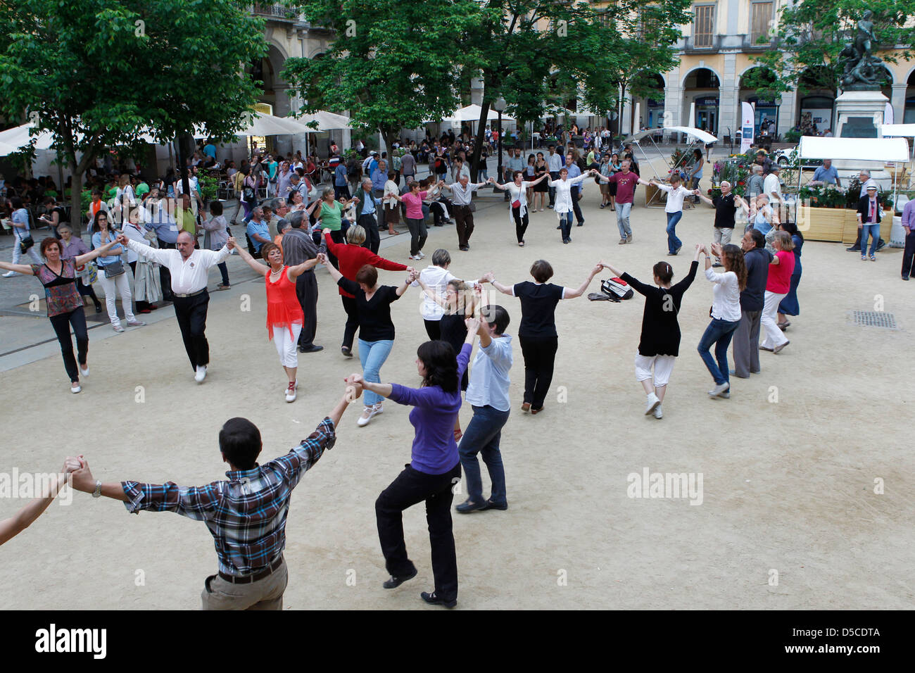 People dancing sardana traditional dance hi-res stock photography and ...