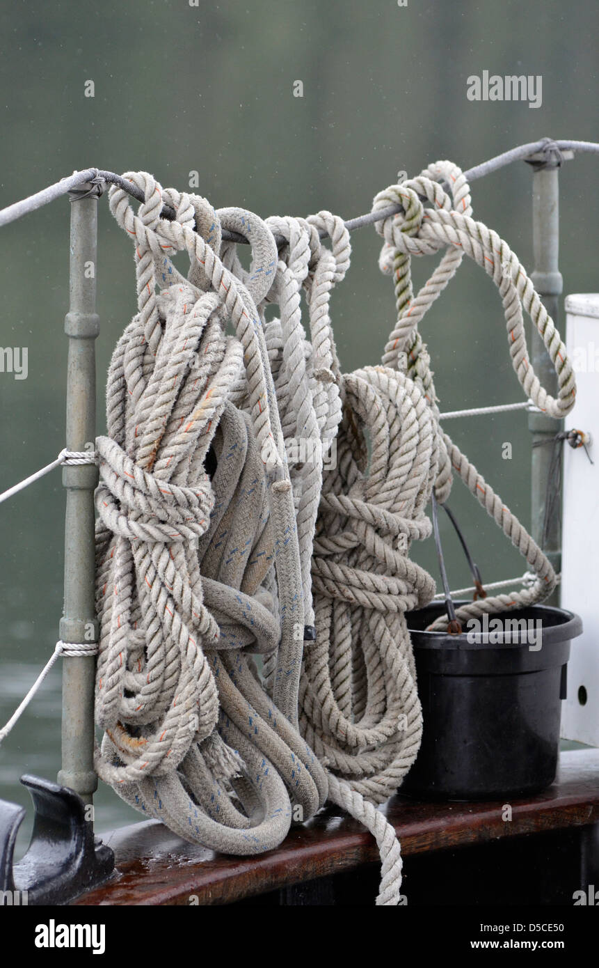 Rope hanging from the railing of a small cruise boat in Southeast Alaska. Stock Photo
