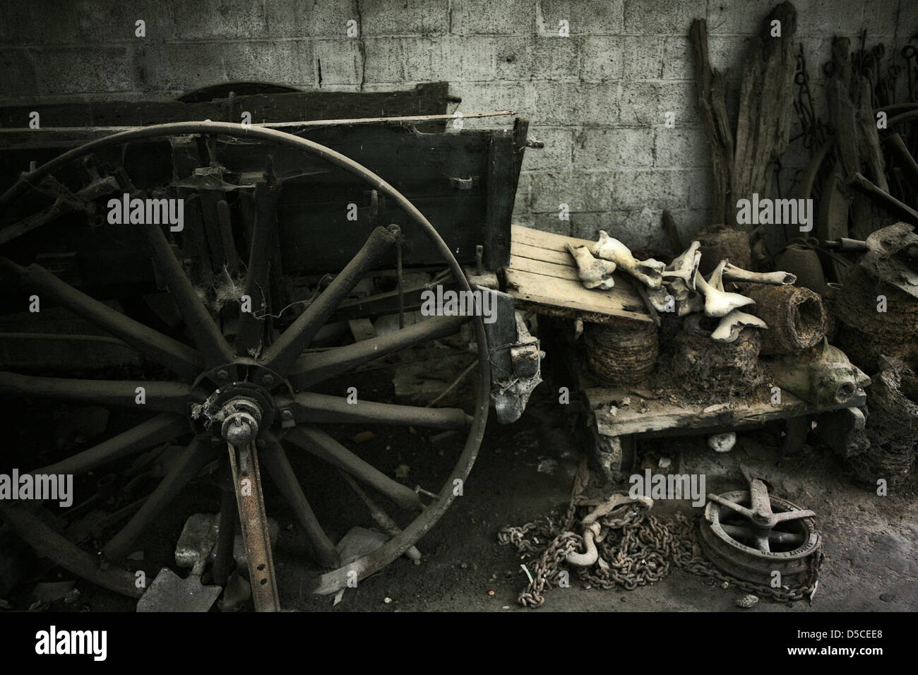 An old cart in muted colour in a barn. Stock Photo