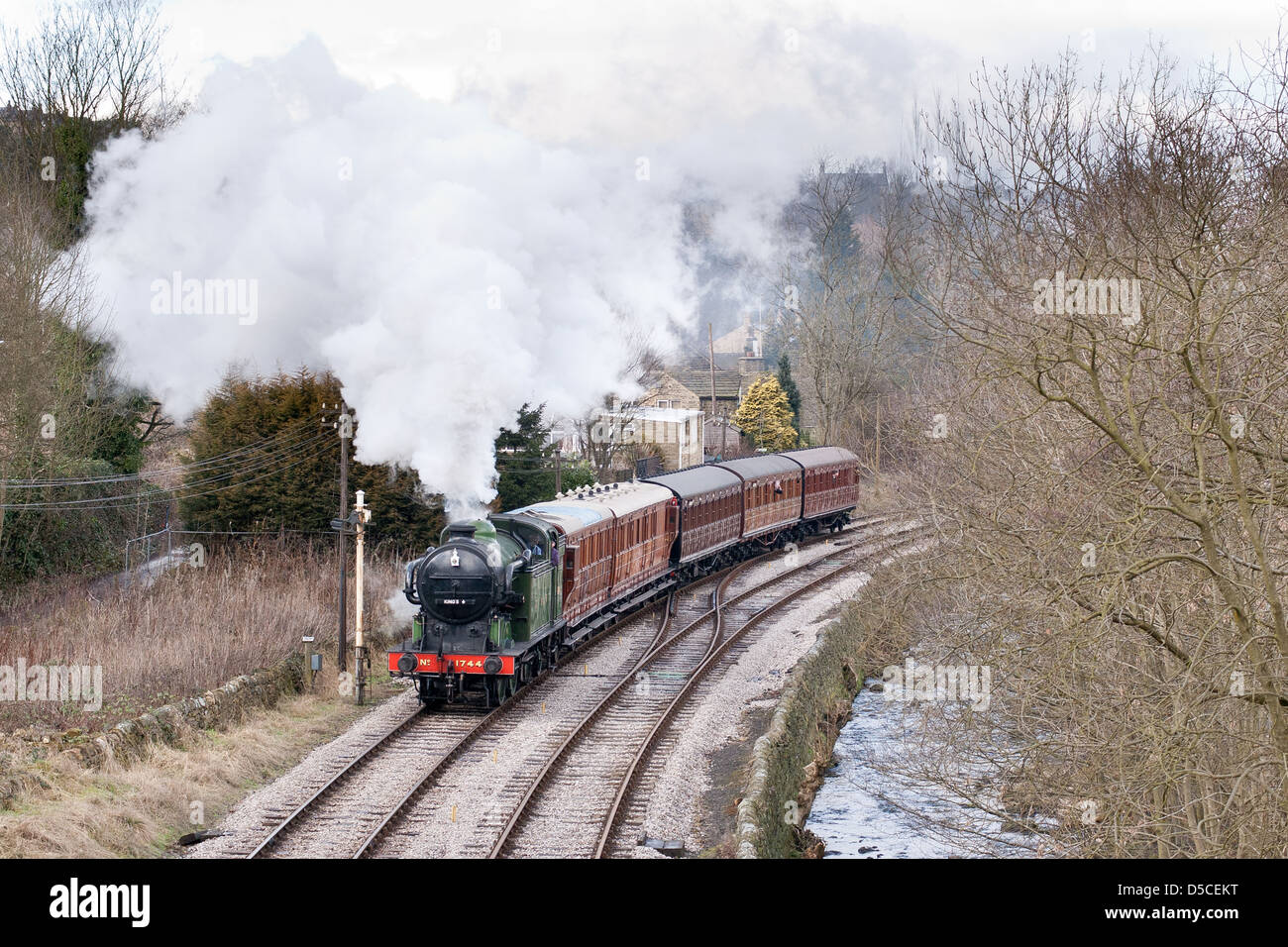 Steam locomotive pulling a passenger train on the Keighley and Worth ...