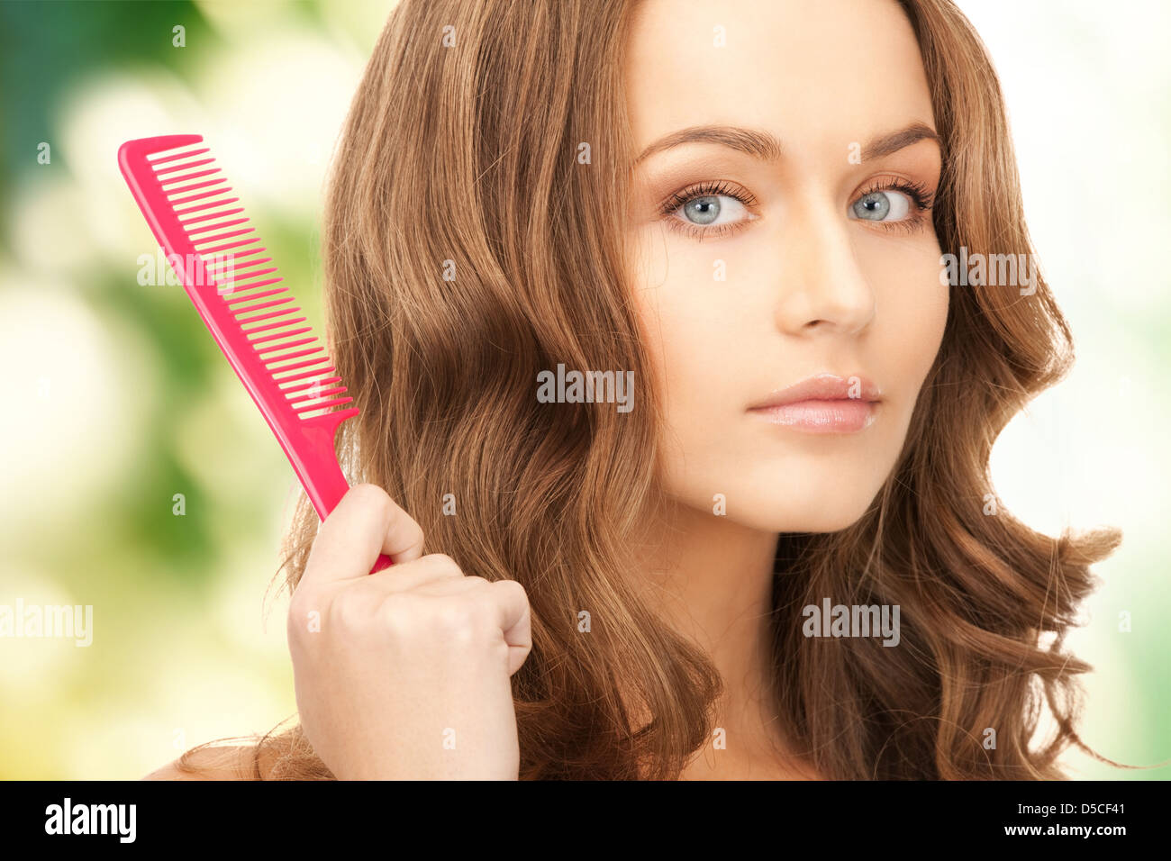 beautiful woman with comb Stock Photo