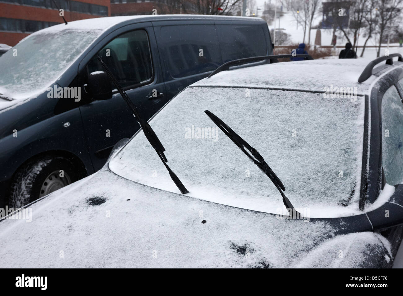 car windscreen wipers left vertical to stop them freezing to windscreen hammerfest finnmark norway europe Stock Photo
