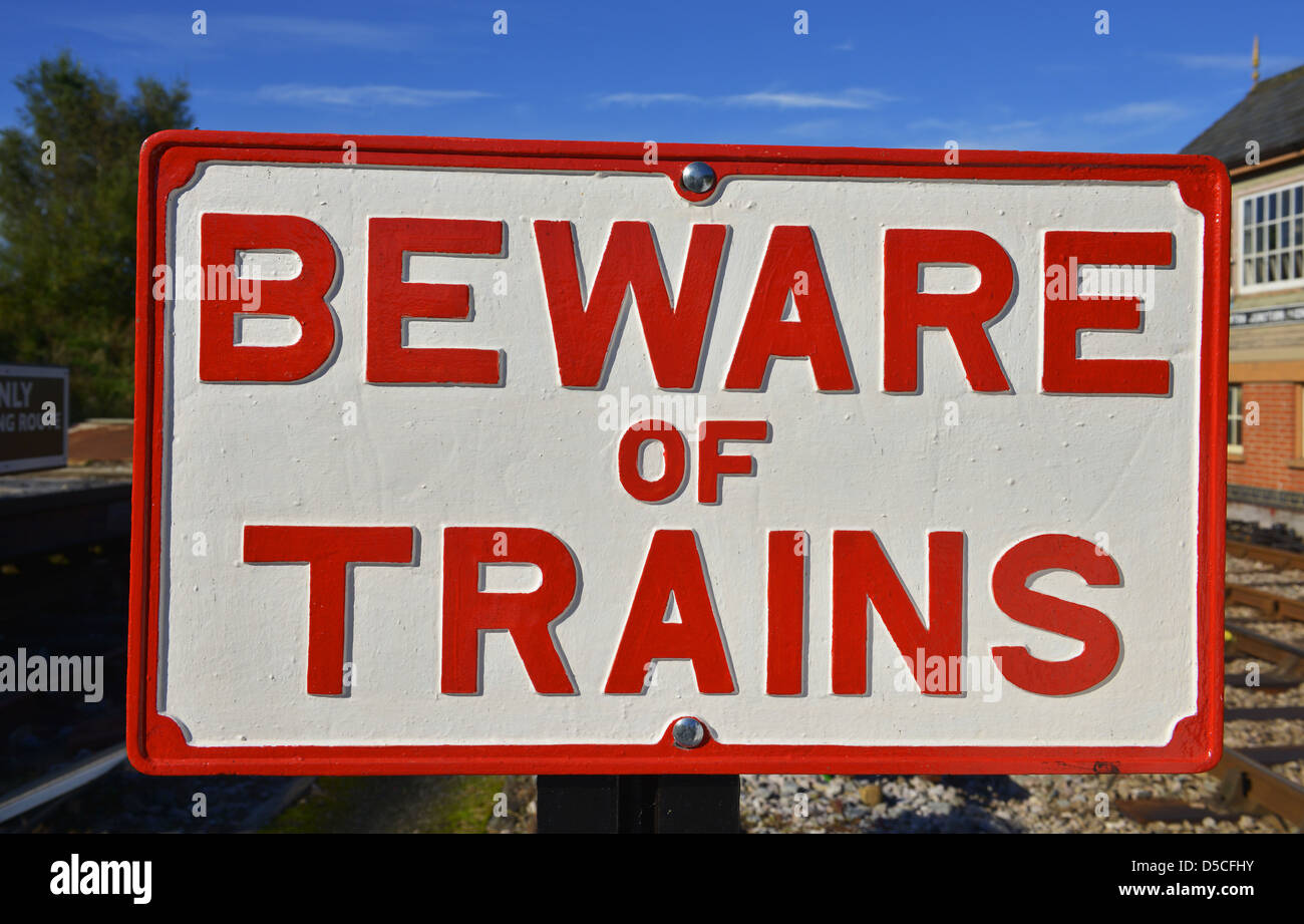 Beware of Trains sign, UK Stock Photo