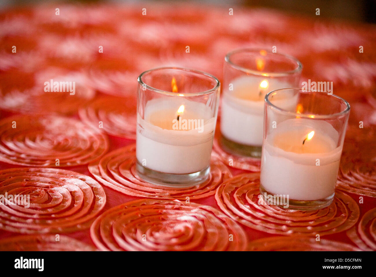 Candle, three lit candles Stock Photo