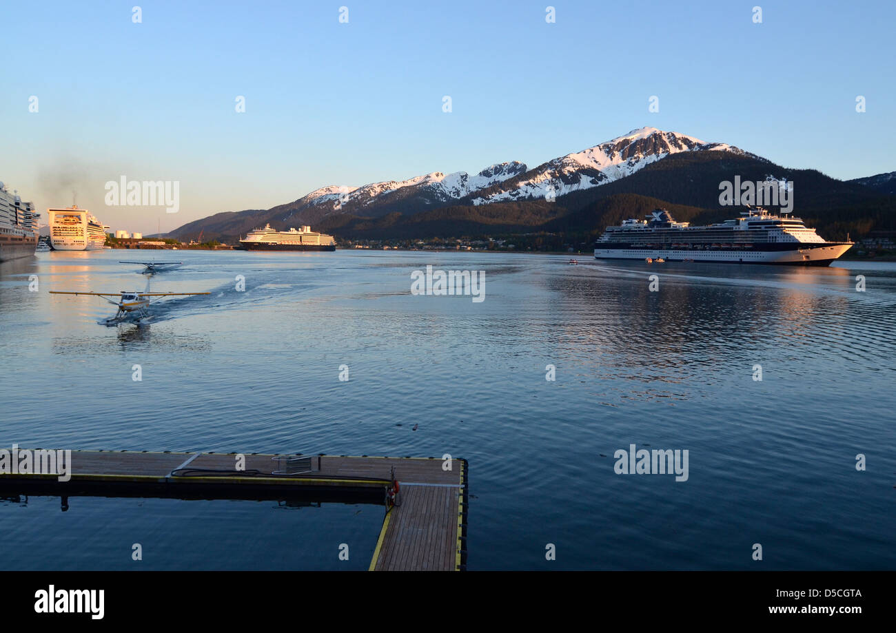 Floatplanes coming in to dock after taking tourists from cruise ships on flightseeing tours, Juneau, Alaska. Stock Photo