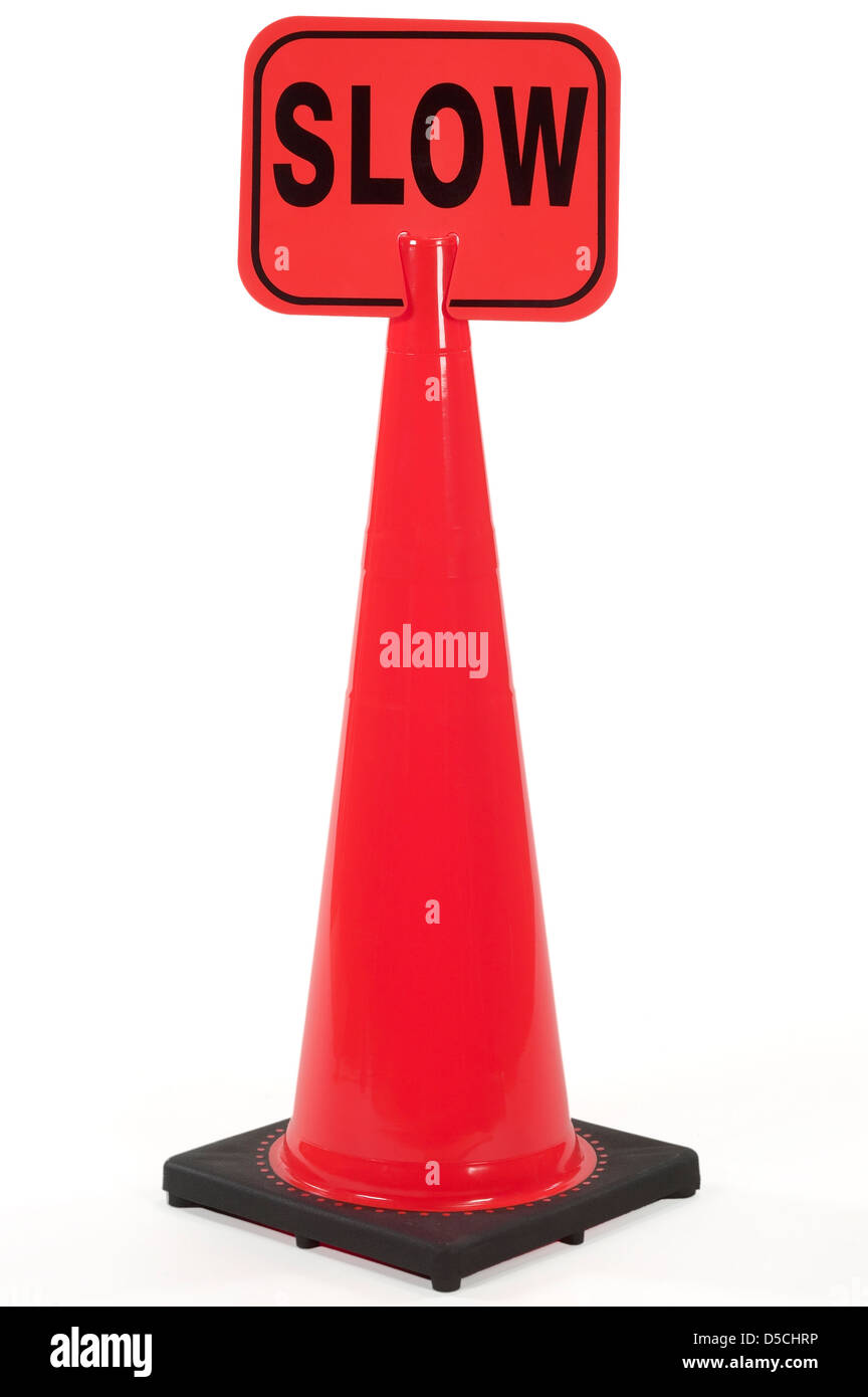 Traffic Cone With Slow Sign Stock Photo