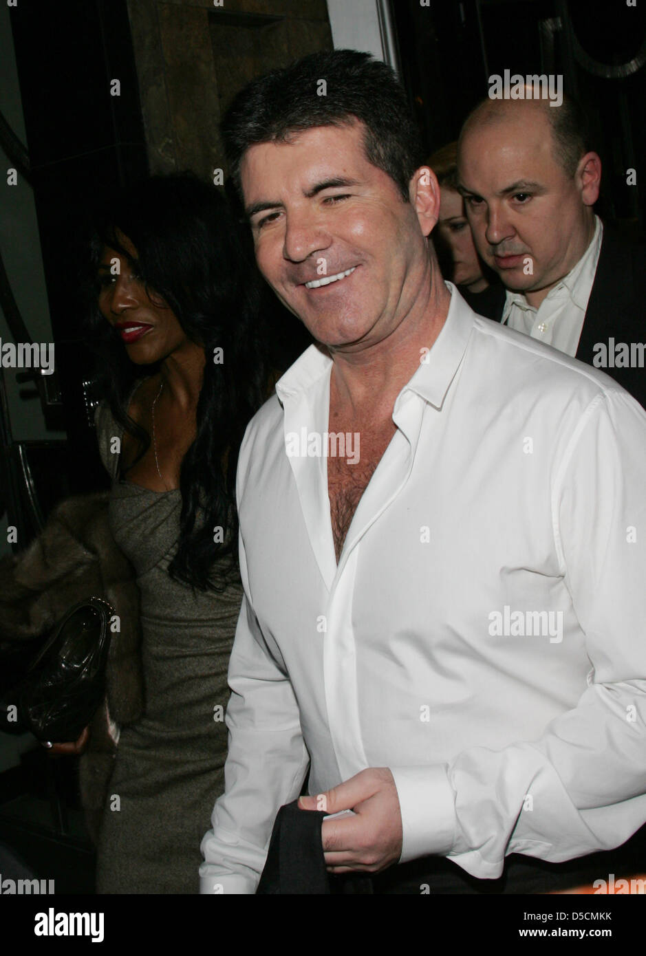 Simon Cowell and Sinitta attend The Health Lottery Fundraising Event Credit: WFPA / Alamy Live News Stock Photo