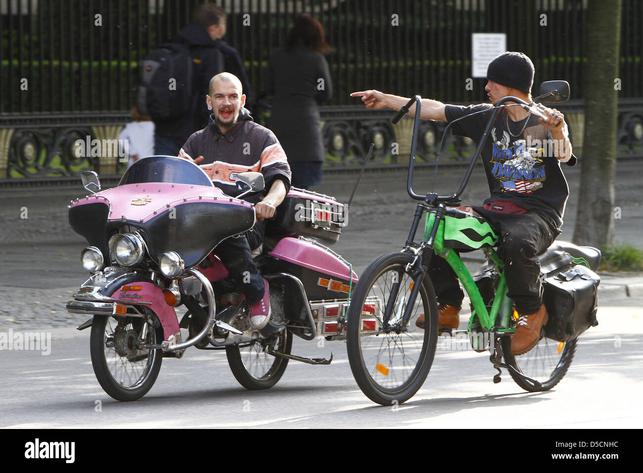Riders on bicycles designed like chopper motorbikes riding on Unter den ...
