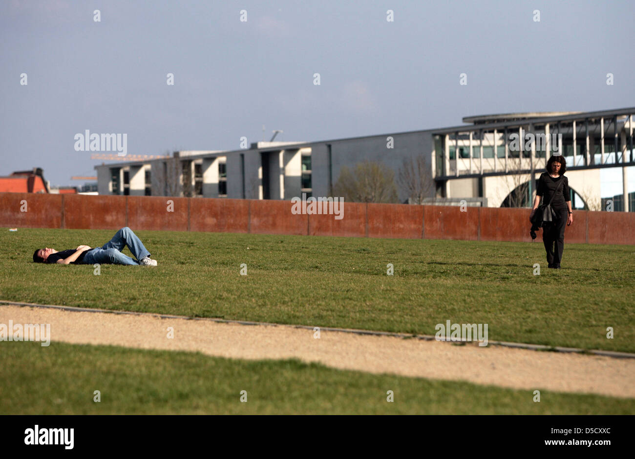 Berlin, Germany, people on a meadow in Riegierungsviertel in Berlin-Tiergarten Stock Photo
