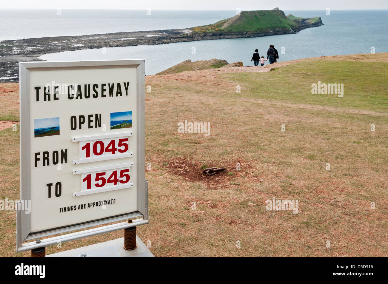 Wales, Gower Peninsula, Rhossili, Worms Head, causeway sign Stock Photo