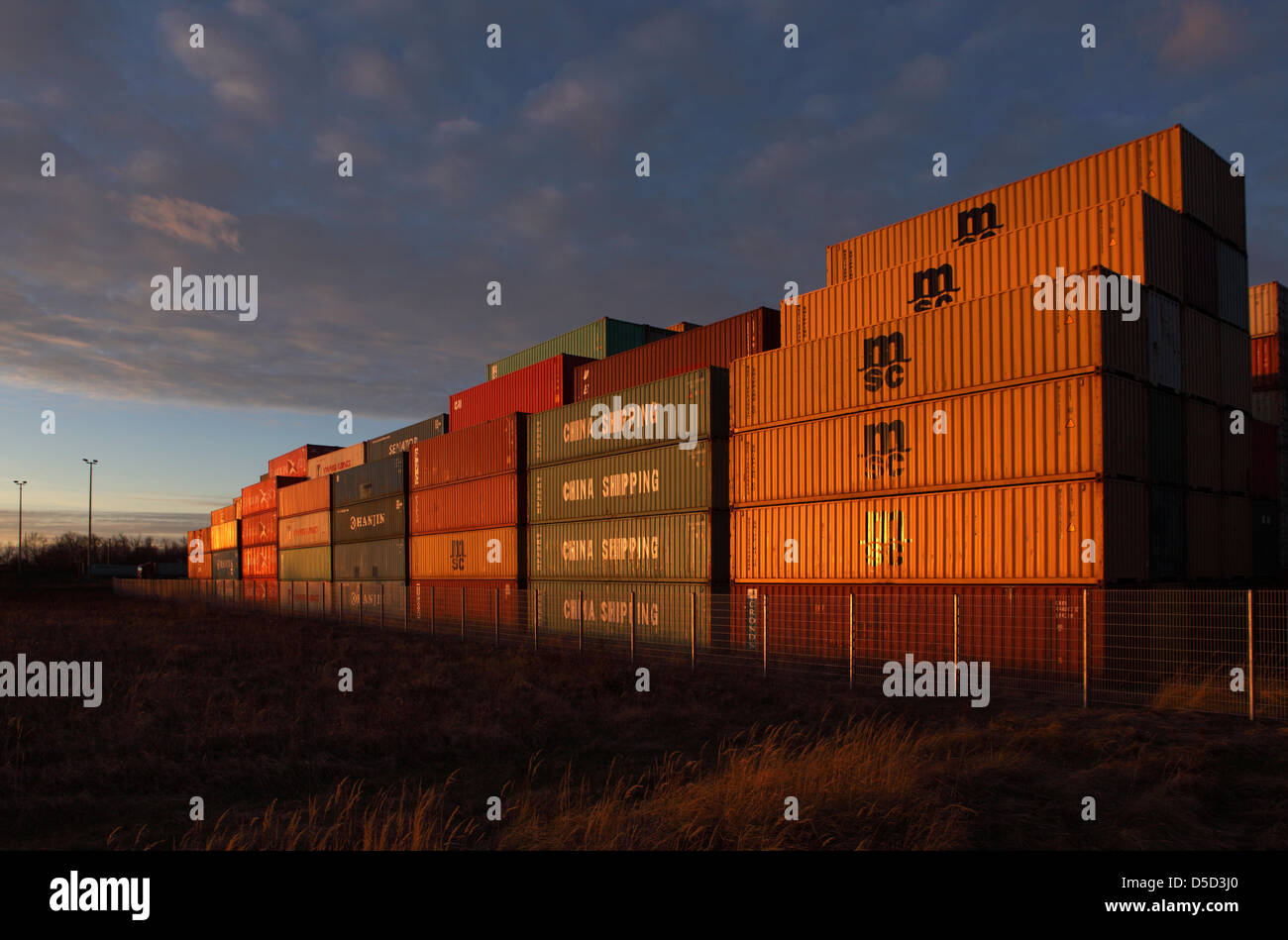 Ludwigsfelde, Germany, stacked cargo containers in the industrial park Ludwigsfelde-Ost Stock Photo