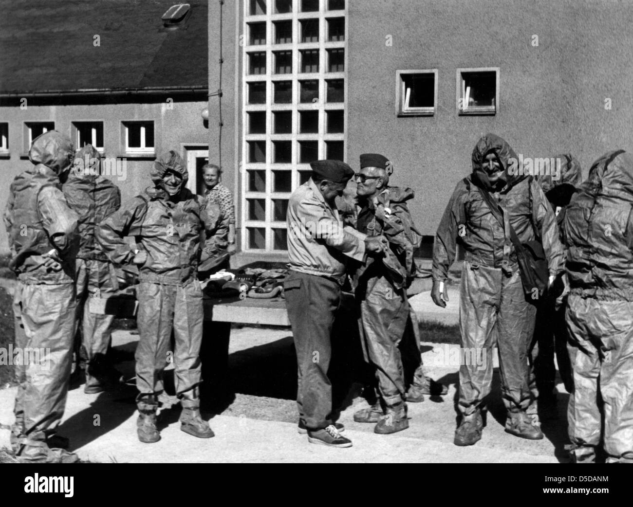 People during civil defence drill, Neuenhagen, GDR Stock Photo