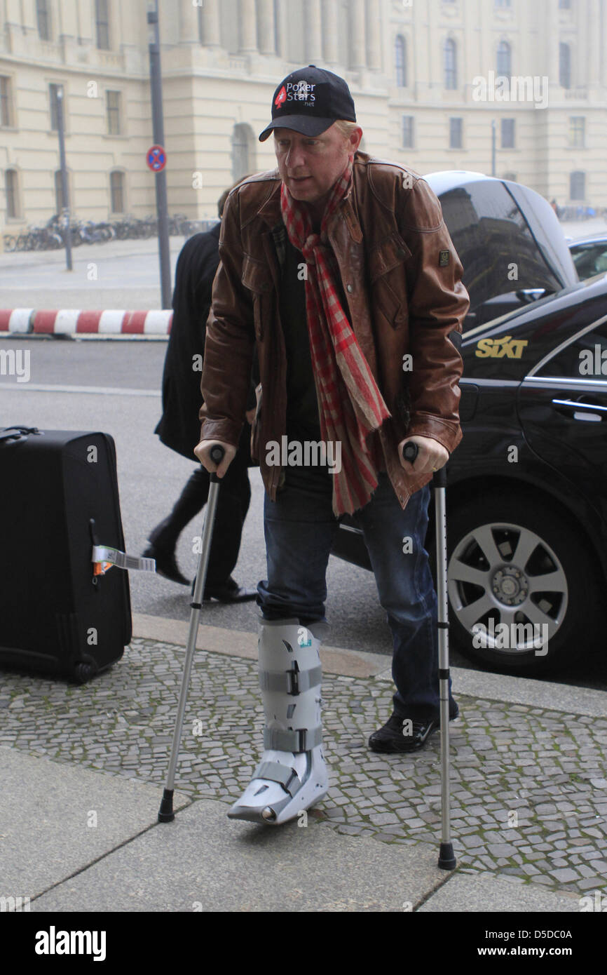 Boris Becker arriving on crutches at Hotel de Rome. Berlin, Germany - 09.11.2011 Stock Photo